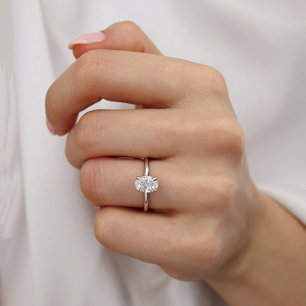 Model hand showing the sparkle of the solitaire from a tilted perspective.