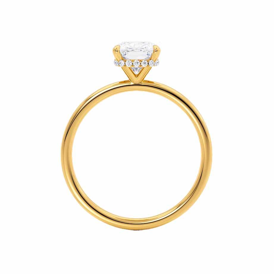 Side profile of the yellow gold solitaire ring with prong setting.