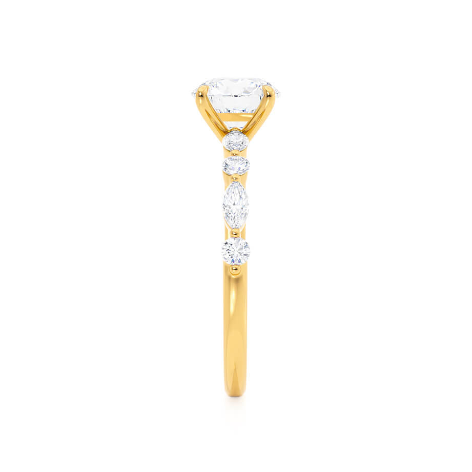 Side profile of ASTER oval cut lab diamond yellow gold engagement ring with marquise and round side stones