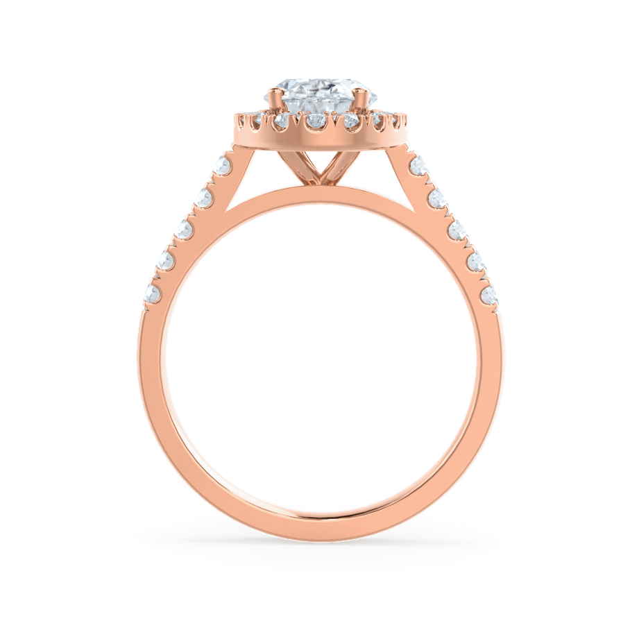 Side view of PEONY oval cut lab diamond 18k rose gold halo engagement ring, pavé diamond shoulders and 4-prong setting