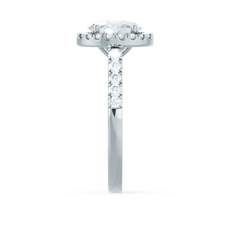Top view of PEONY oval cut lab diamond 18k white gold halo engagement ring, pavé halo and shoulders design