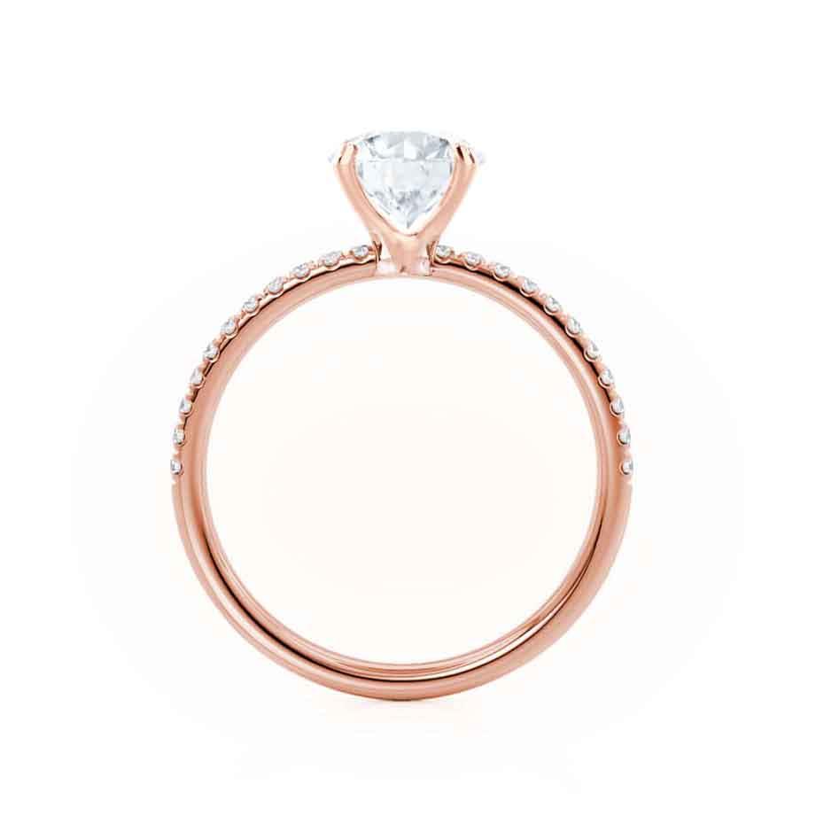 Top view of emerald cut lab diamond engagement ring in 18k rose gold pavé band