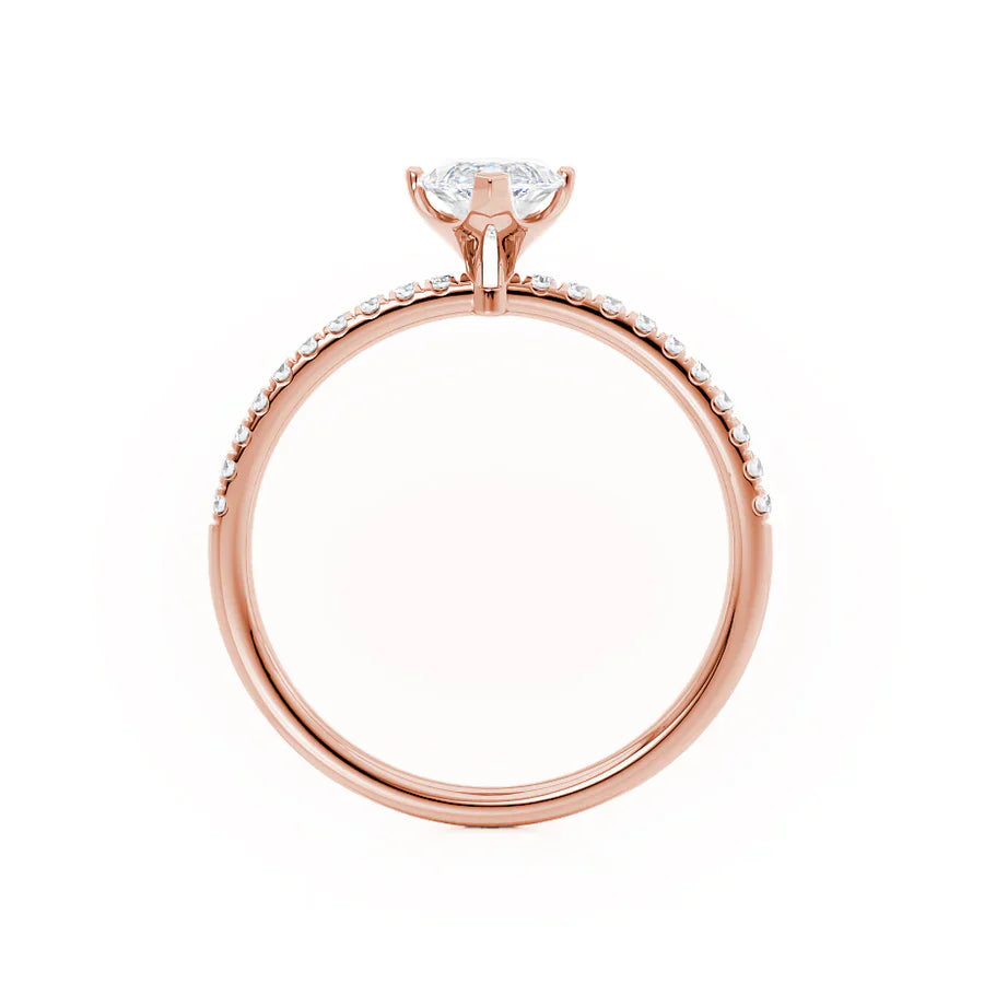 Side view of marquise cut lab diamond solitaire engagement ring in 18k rose gold