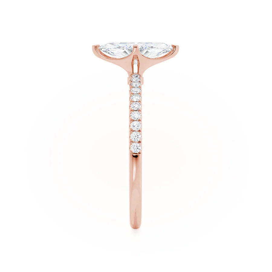 Top view of marquise lab diamond solitaire engagement ring in 18k rose gold with pavé band