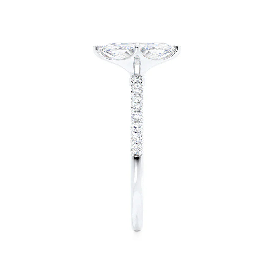 Top view of marquise lab diamond solitaire engagement ring in 18k white gold with pavé band