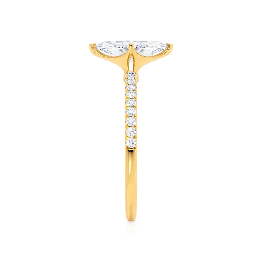 Top view of marquise lab diamond solitaire engagement ring in 18k yellow gold with pavé band