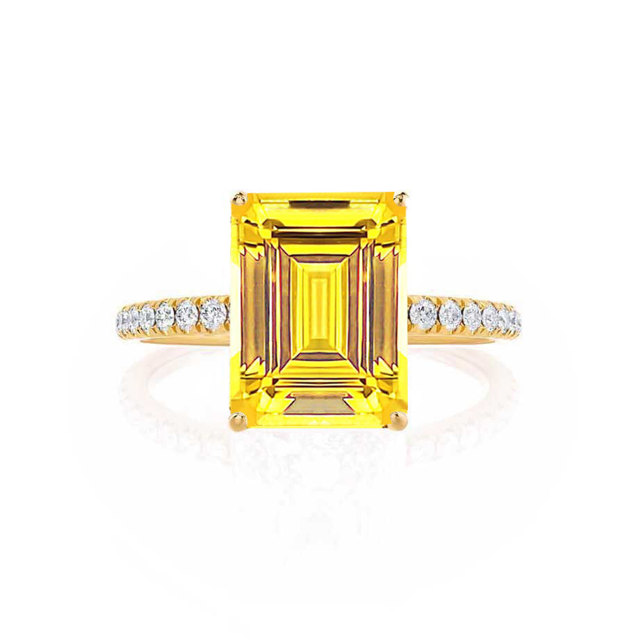 Detailed side profile that captures the harmony between gemstone height and minimal pavé diamond structure.