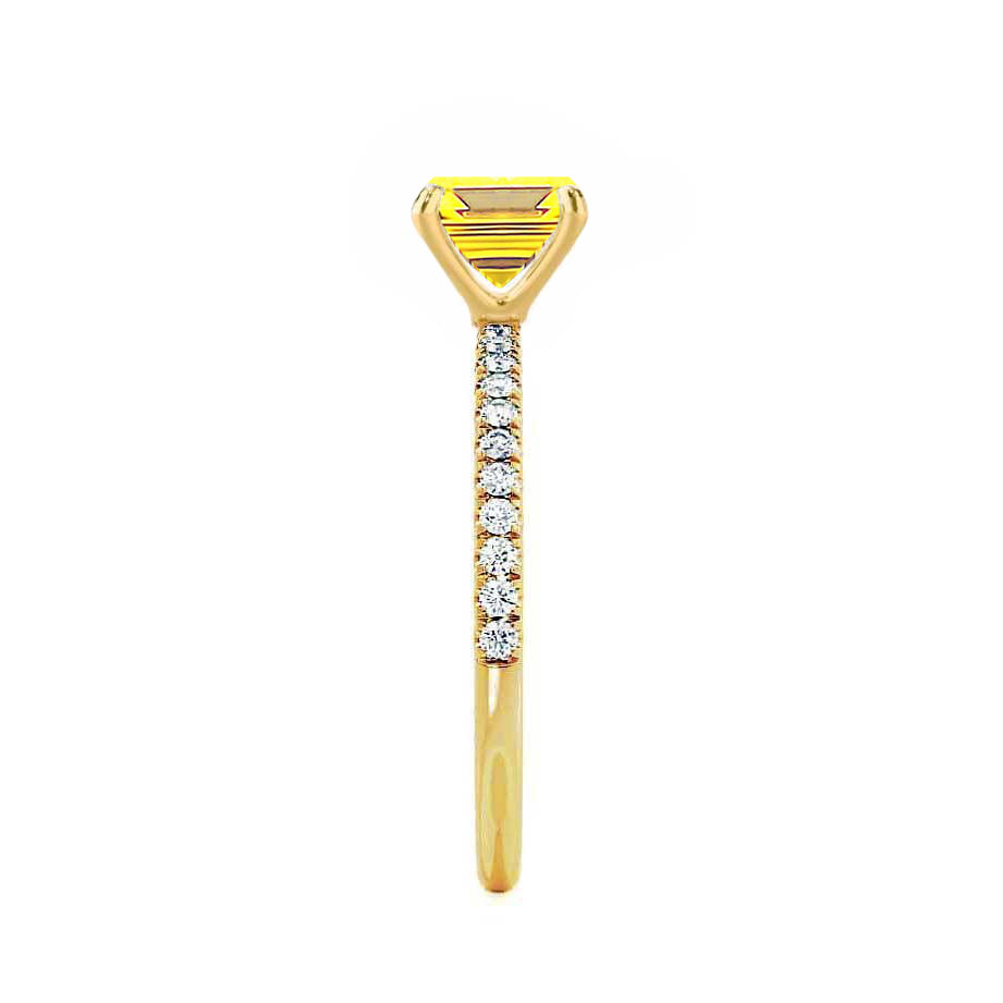 Side view emphasizing the elegant four-prong setting and the refined band profile.