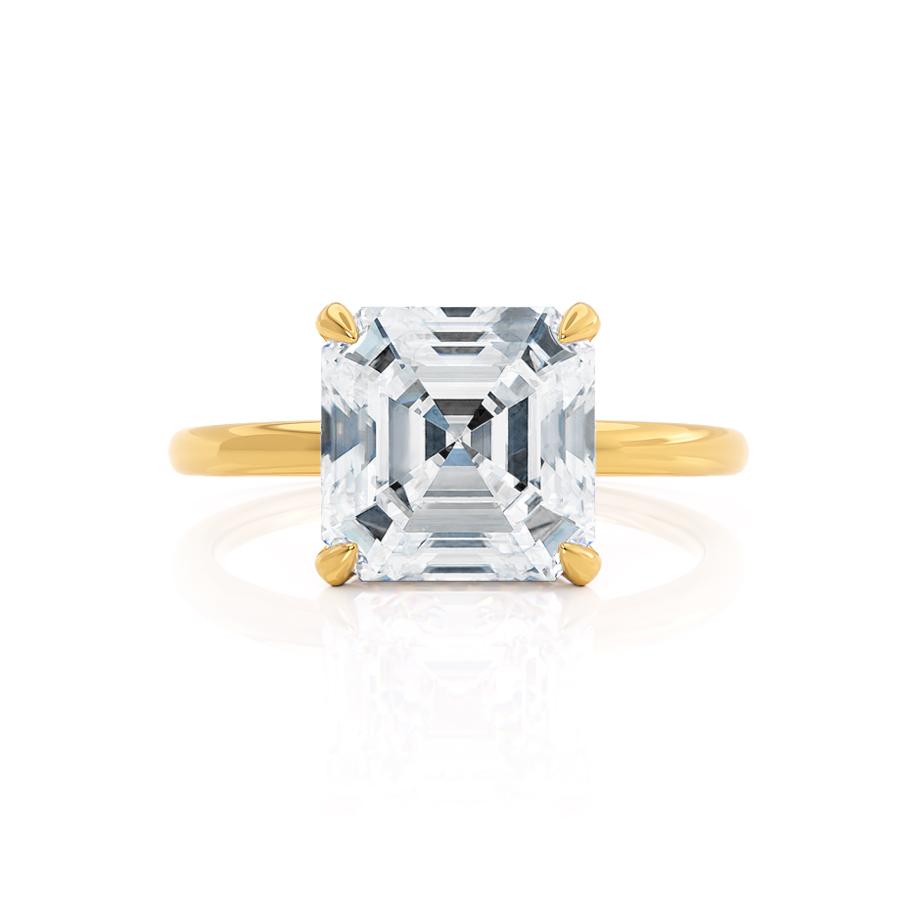 Bottom angle of Camellia asscher lab diamond ring showing hidden halo in 18k yellow gold