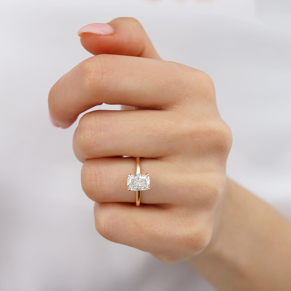 Model hand shot with graceful fingers highlighting the warm hue of rose gold and balanced sparkle.