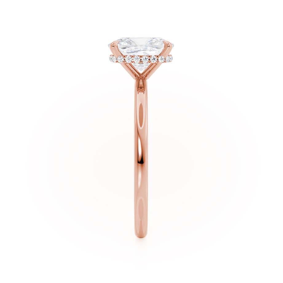 Slim band profile with subtle elegance and diamond-centred focus from the side.