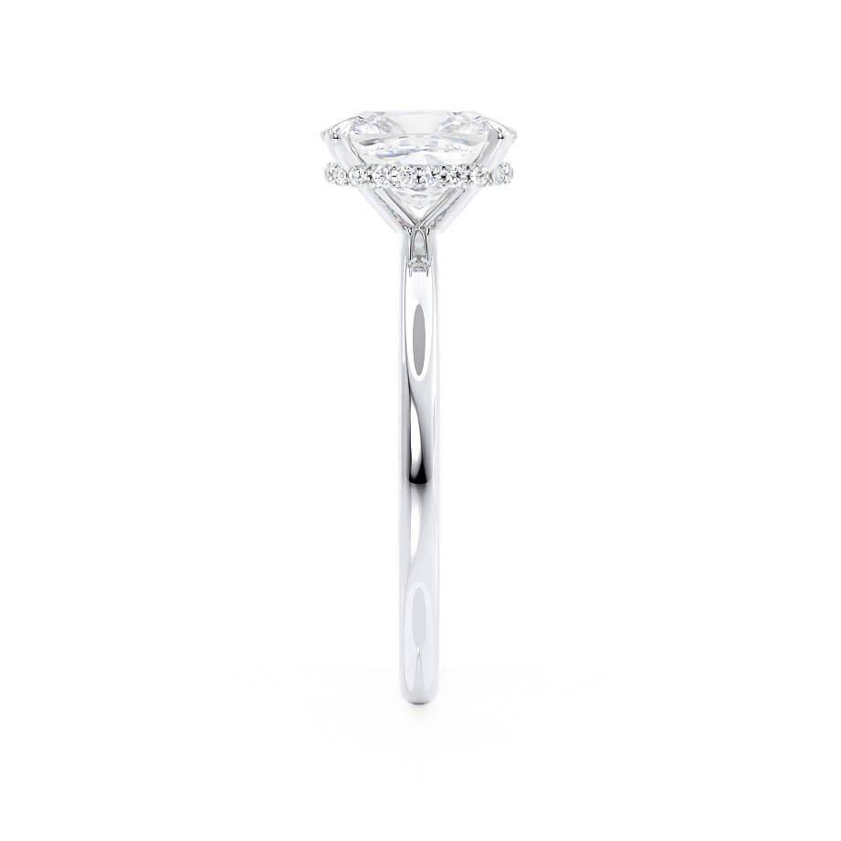 Sleek side view showing the slim white gold band and elevated centre diamond.