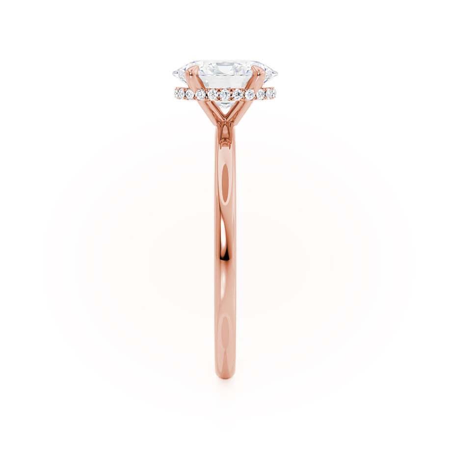 Another side angle of the Camellia ring, revealing the elevation of the setting and refined rose gold finish.