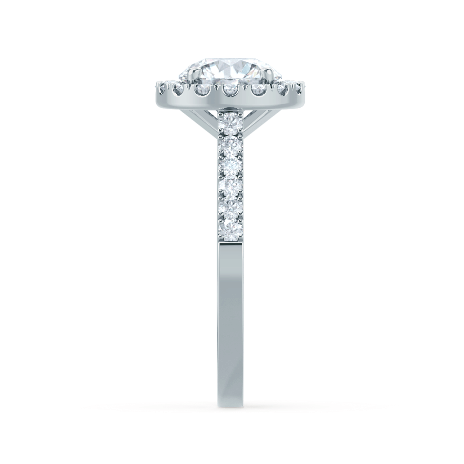 Side profile showing halo and diamond setting of Daisy ring in platinum