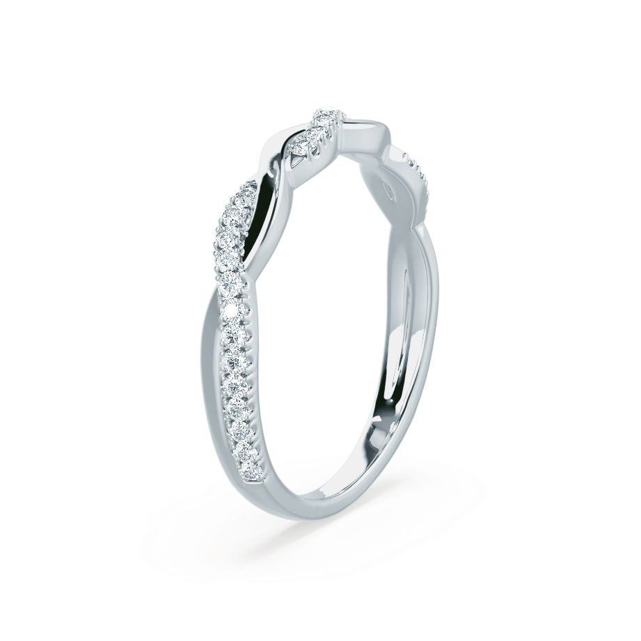 Angled image of the leaf-style diamond band with soft curves and milgrain edges.