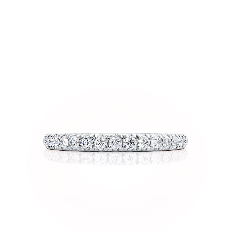Side angle view highlighting the delicate profile and seamless diamond setting of the LUNA eternity wedding band.