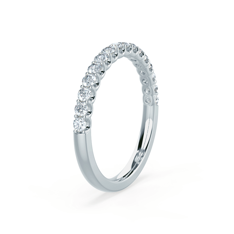 Angled perspective of the eternity ring displaying its full diamond row design and lustrous white gold band.