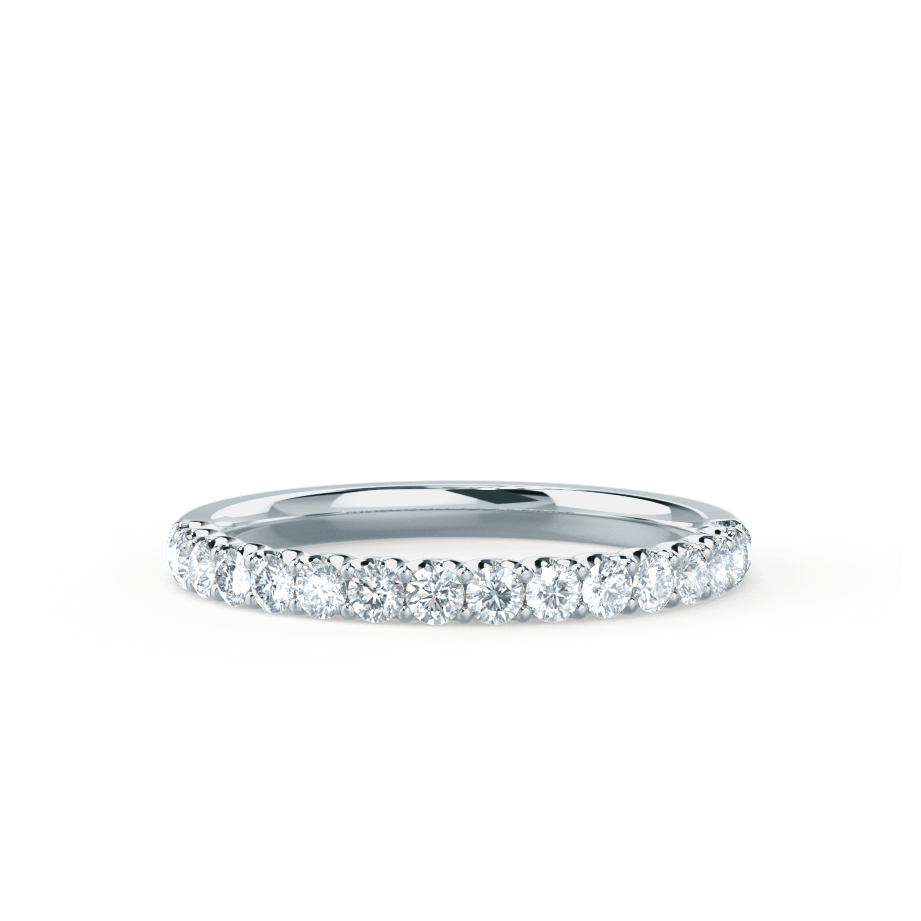 Side view of the ring's gentle curvature and full pavé coverage, reflecting refined craftsmanship.