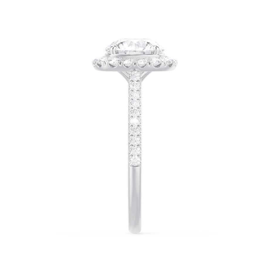 Top view of elongated cushion cut lab diamond halo engagement ring in 18k white gold