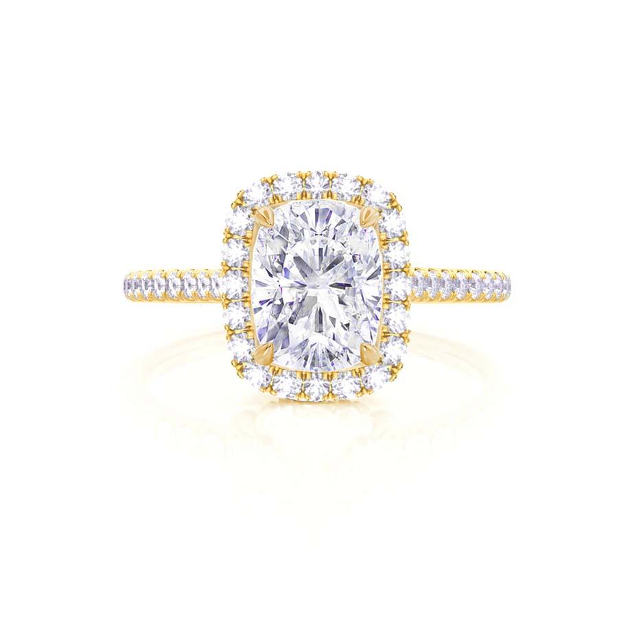 Profile view of elongated cushion cut lab diamond halo engagement ring in 18k yellow gold