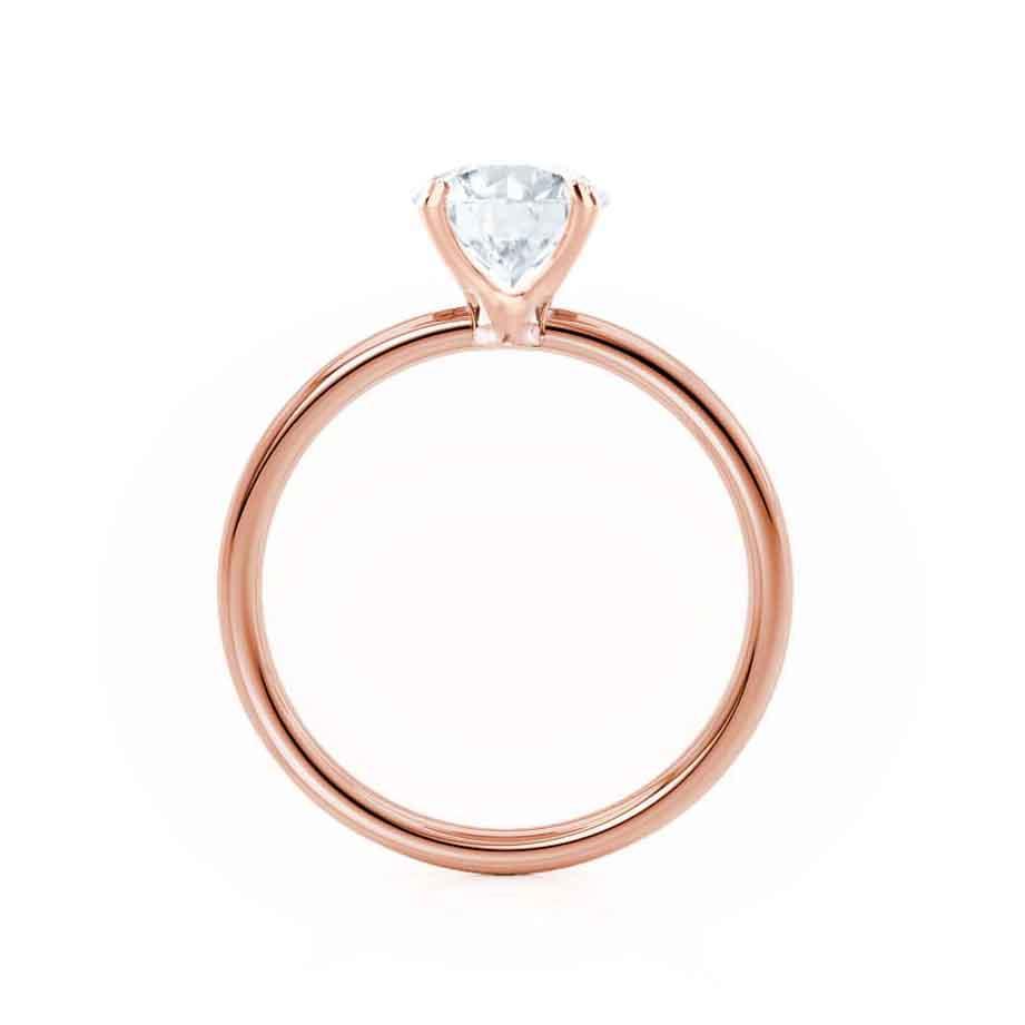 Angled view of oval cut lab diamond ring in 18k rose gold band