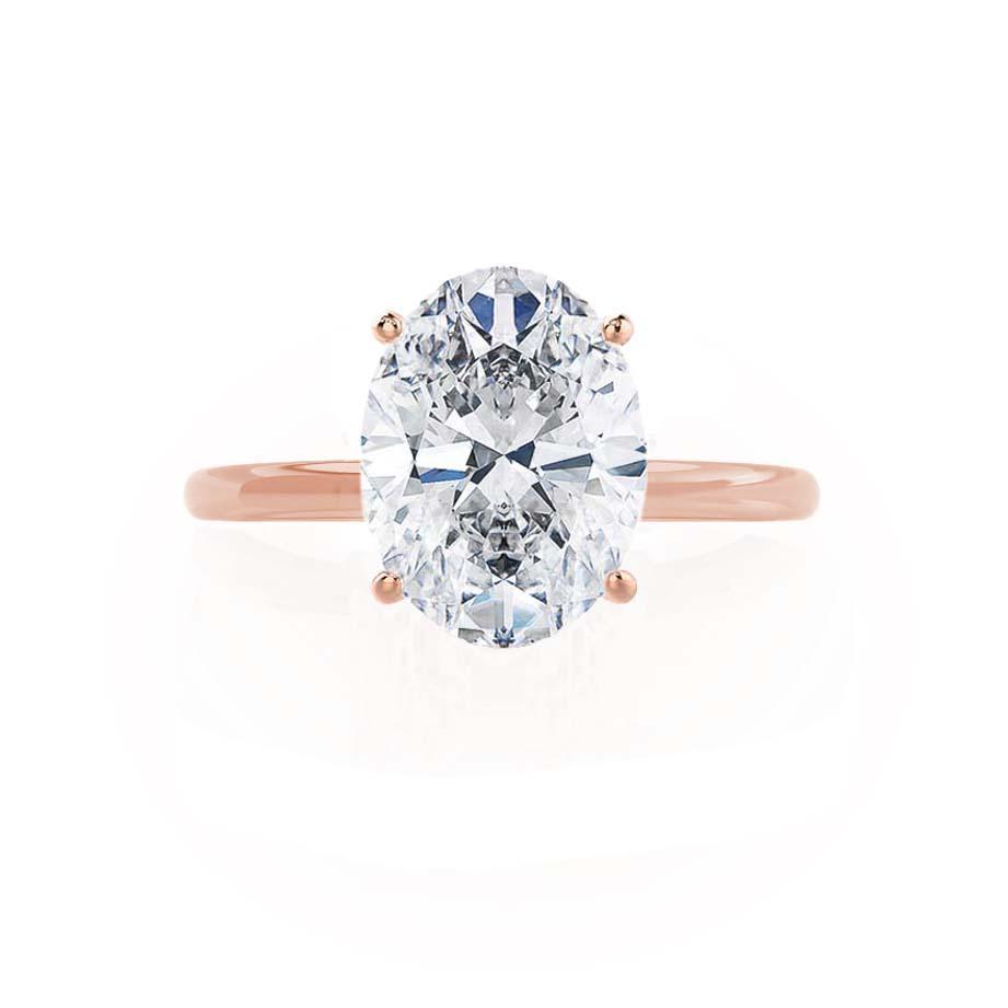 Side profile of rose gold petite band with oval lab grown diamond setting
