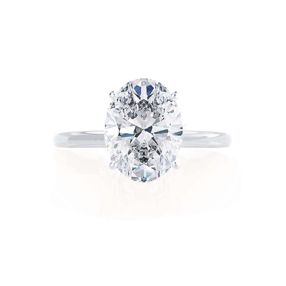 Angled view of the ORCHID engagement ring with oval diamond in white gold setting