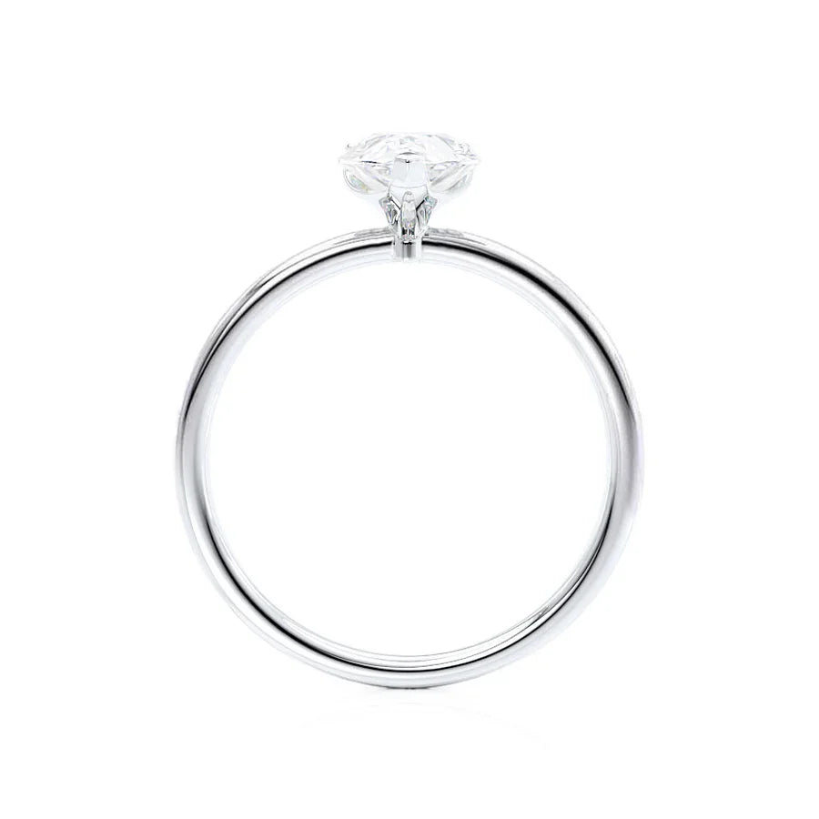 Profile view of pear shaped lab diamond petite solitaire engagement ring in platinum
