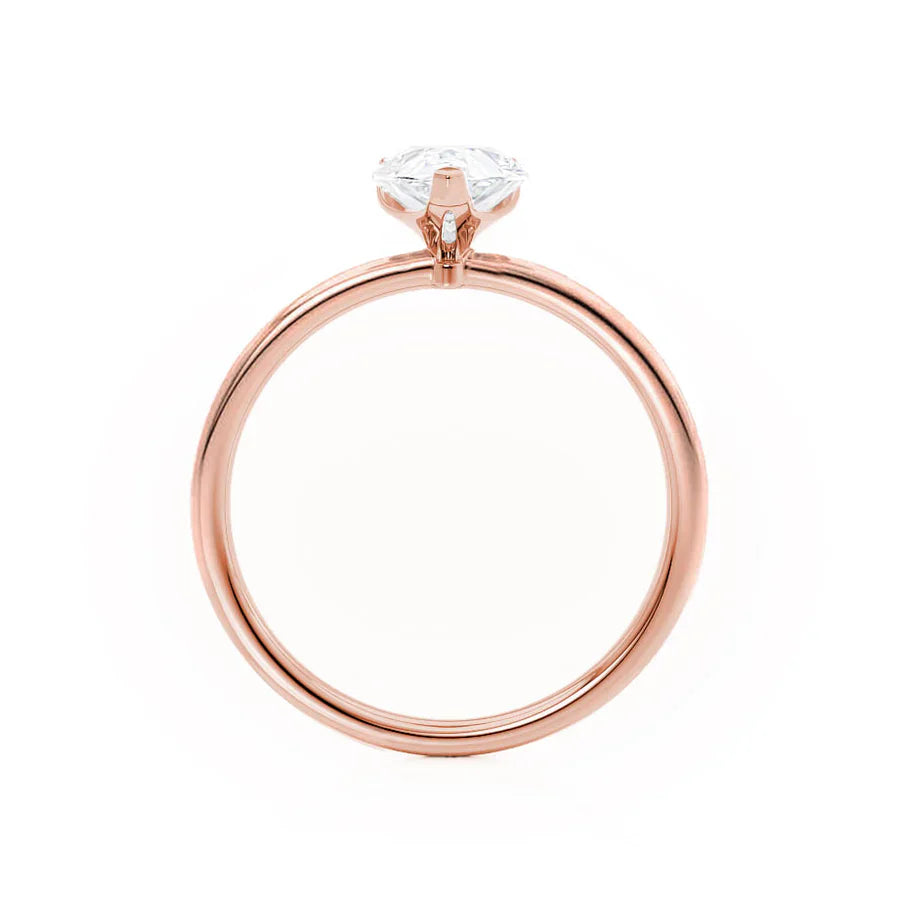 Side view of pear lab diamond solitaire engagement ring in 18k rose gold
