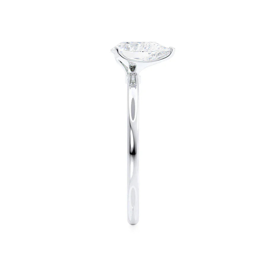 Top view of pear cut lab diamond solitaire engagement ring in 18k white gold