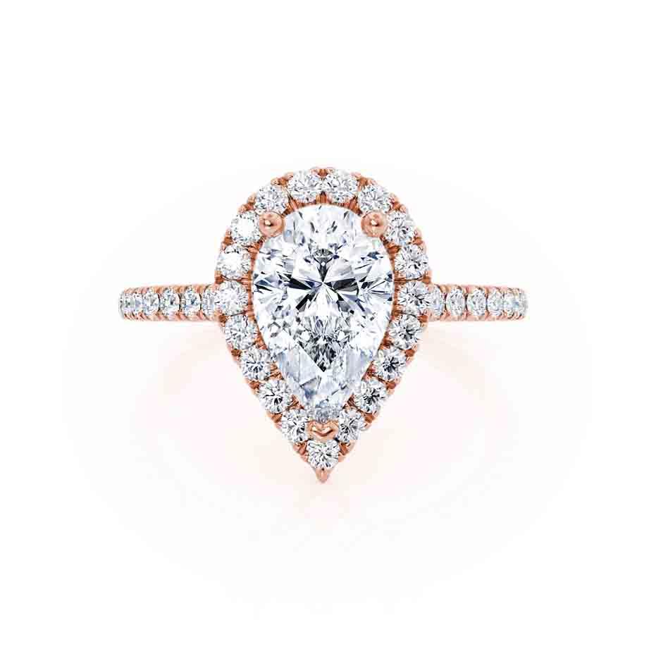 Top view of pear-shaped lab diamond petite halo engagement ring in 18k rose gold