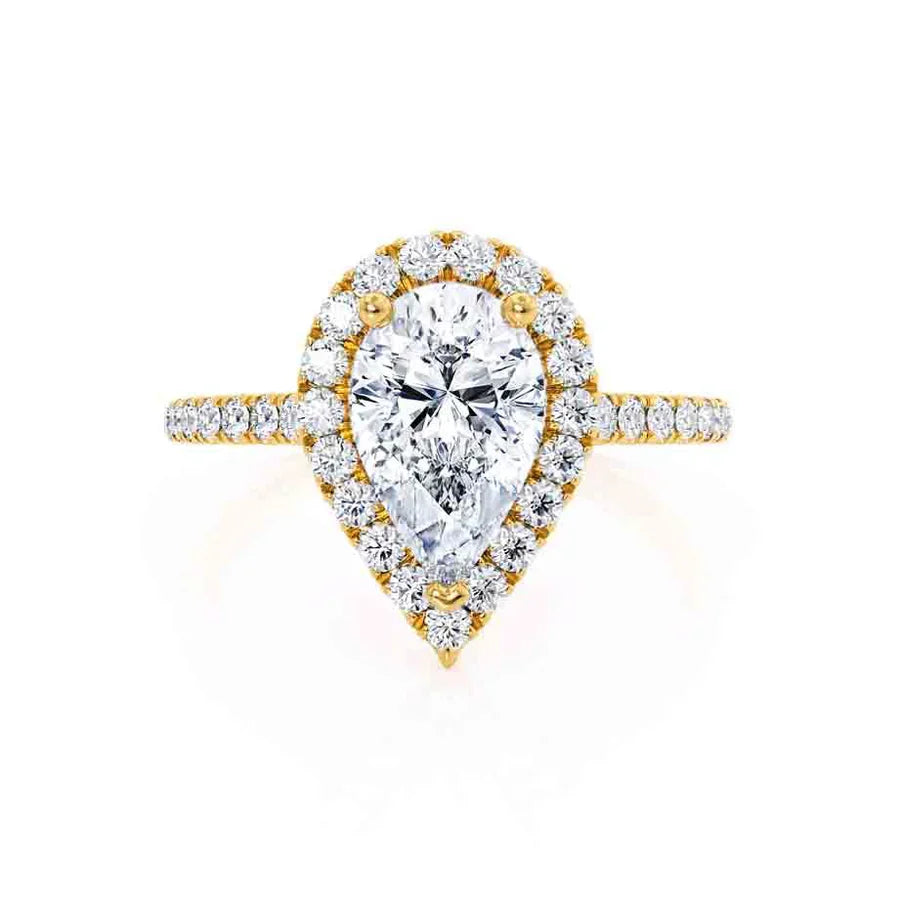 Top view of pear lab diamond petite halo engagement ring in 18k yellow gold