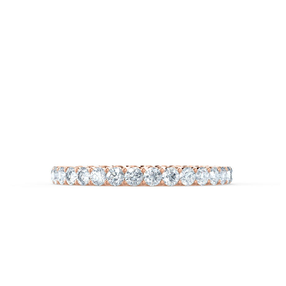 Side profile of a dainty rose gold band with sleek pavé setting for everyday wear.