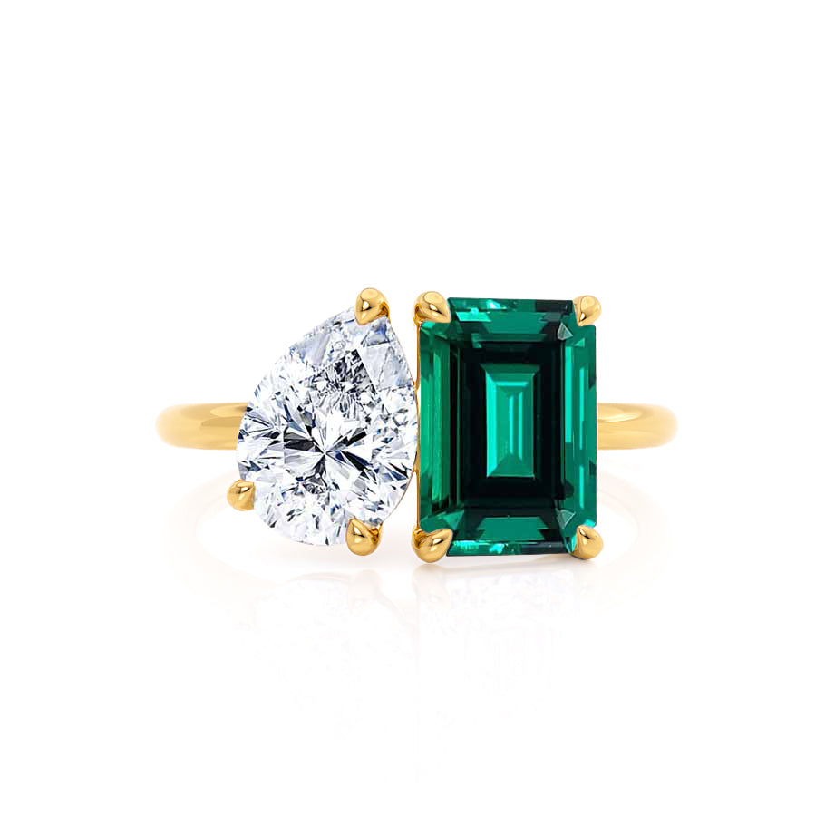 Angled view – Captures the dynamic pairing of stones and warm gold tones in a modern Toi et Moi silhouette.