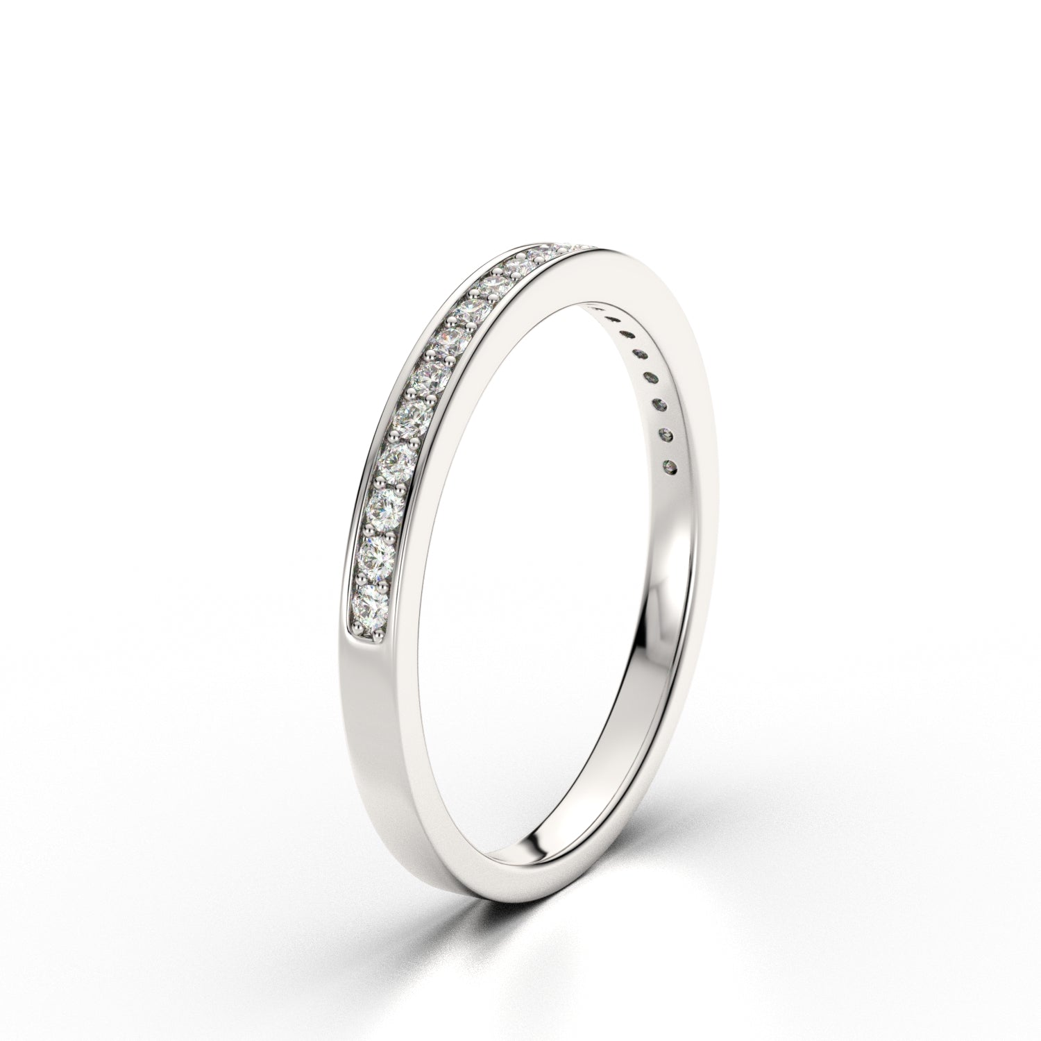 Inner-engraved slim white gold ring with subtle pavé detailing, timeless and personal.