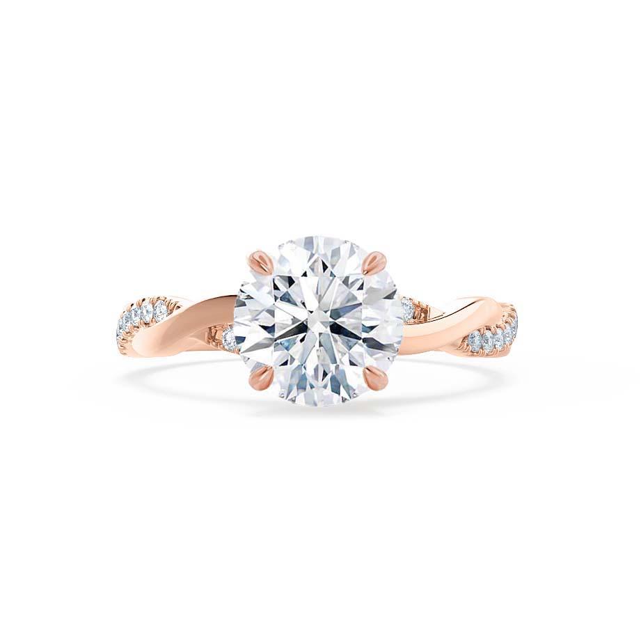 Angled view of the Wisteria rose gold solitaire ring with diamond vine detail