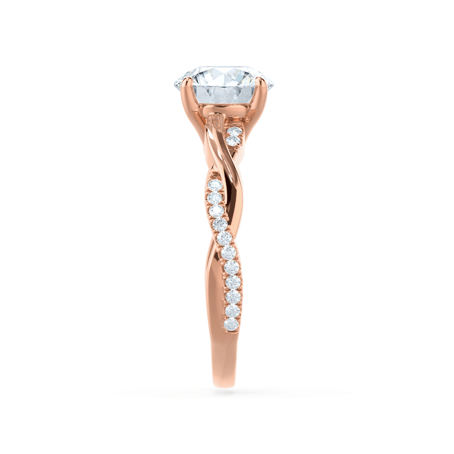 Side profile of the Wisteria lab grown diamond ring with marquise and round side stones
