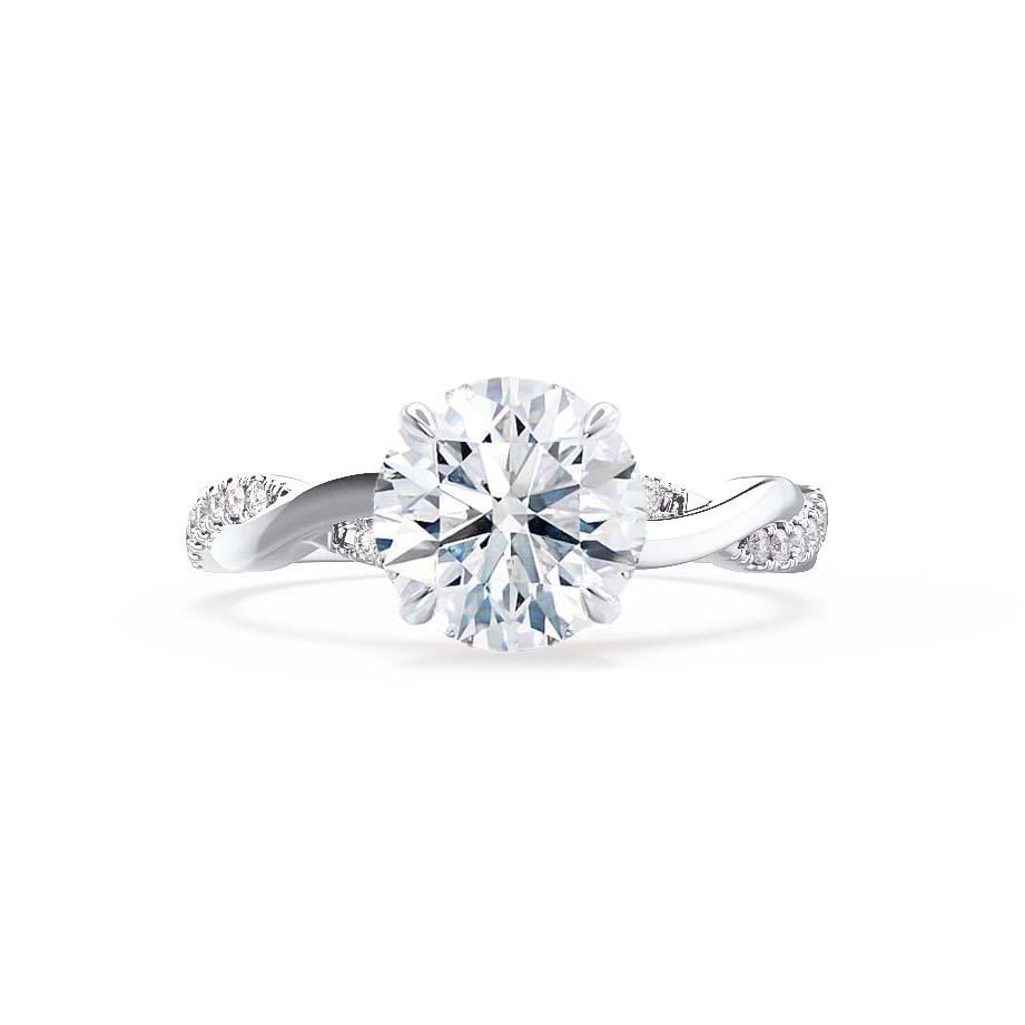 Angled view of the Wisteria round lab diamond solitaire ring with intricate pavé details on white gold band