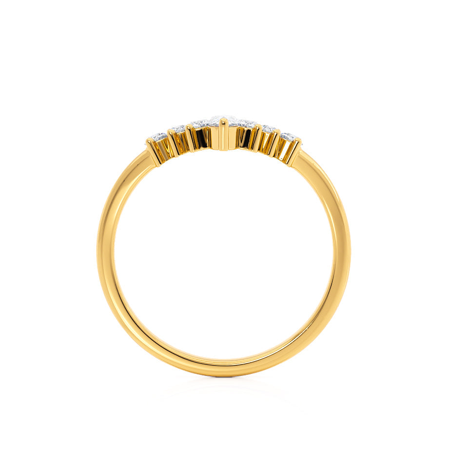 Yellow gold ring featuring horizontal baguette diamonds, viewed from the top.