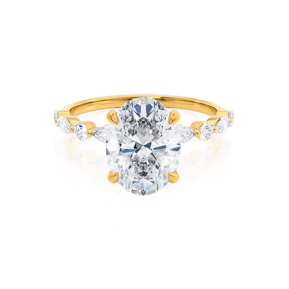 ASTER oval cut lab diamond 18k yellow gold scatter engagement ring, front view with marquise and round diamond band