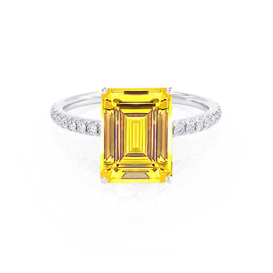 Front view of the vibrant emerald-cut yellow sapphire set in 950 platinum, accented with delicate pavé diamonds.