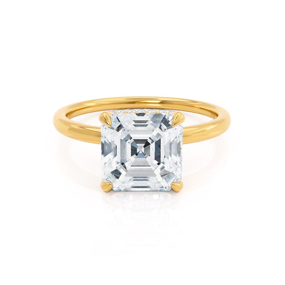 Angled view of Camellia asscher diamond engagement ring in 18k yellow gold