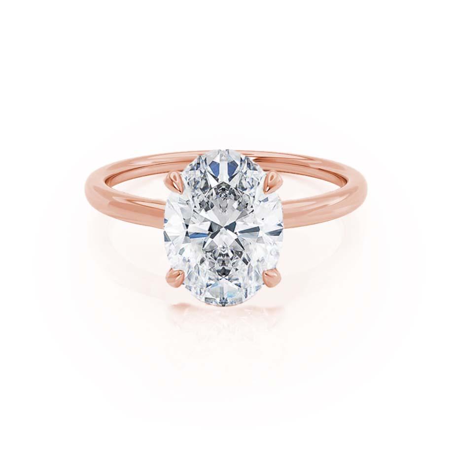 Angled perspective showcasing the Camellia ring's brilliant facets and the soft warmth of the 18k rose gold band.