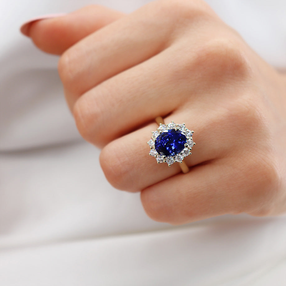 Model hand view 1 – Captures the luminous contrast of deep sapphire and warm gold, radiating confidence and elegance.