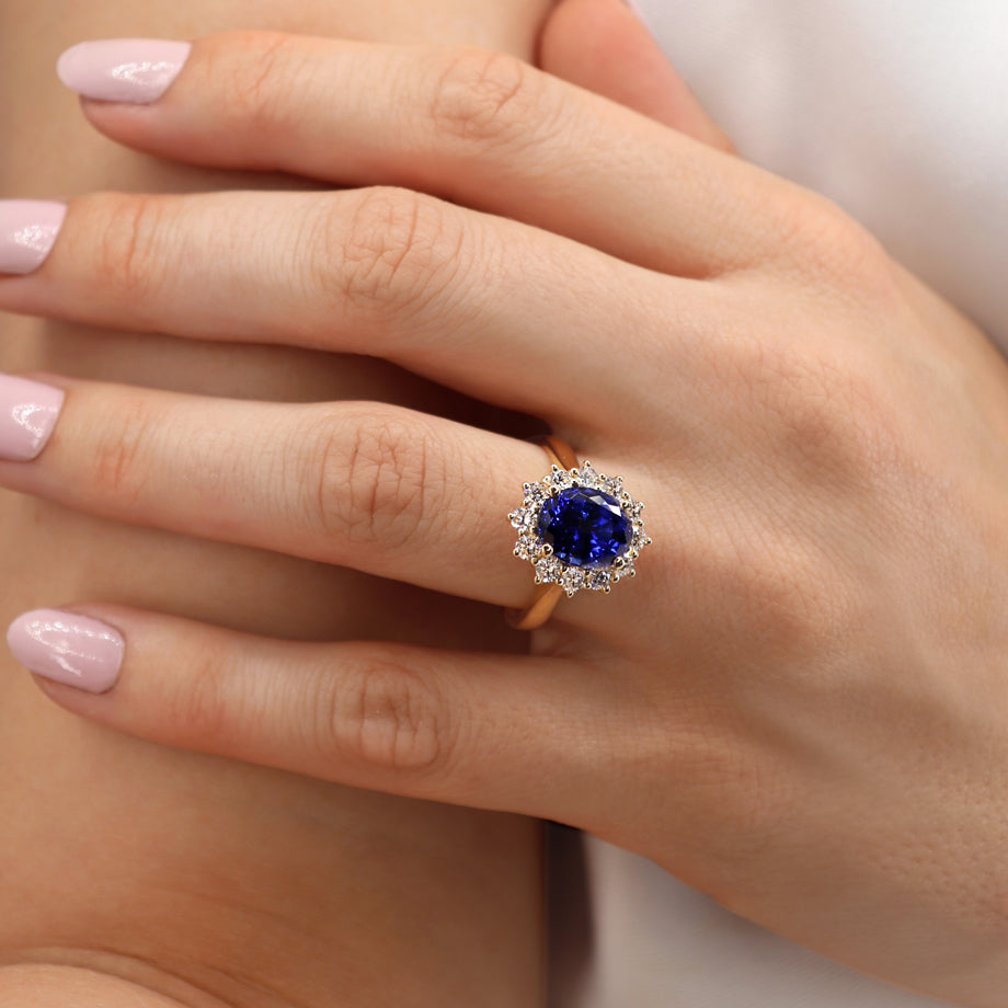 Model hand view 2 – Highlights the timeless charm of the Cornflower Ring when worn, ideal for romantic or formal occasions.