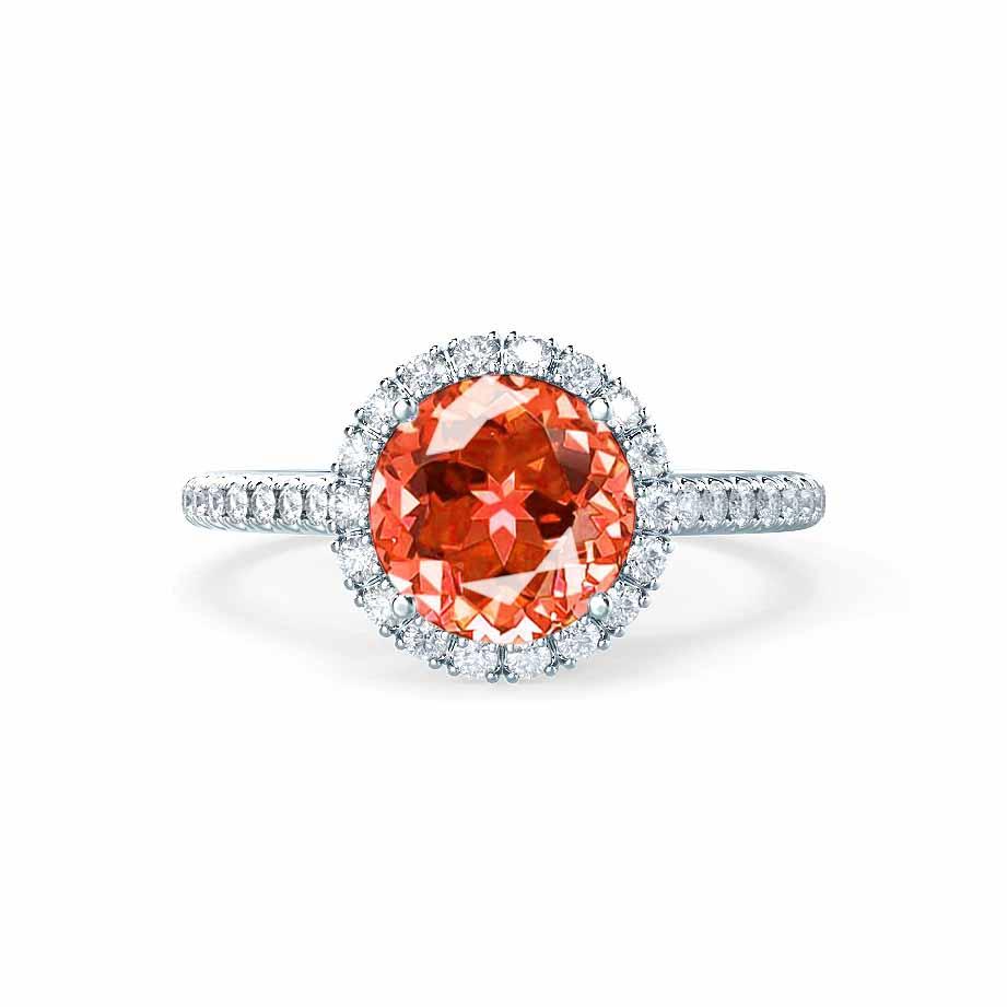 Angled shot showing the harmony between radiant diamond halo and platinum band for a timeless, romantic glow.