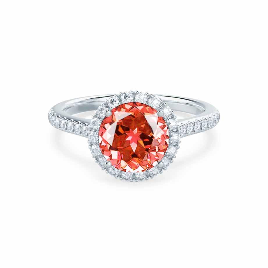 Front view featuring a glowing Padparadscha sapphire surrounded by a delicate halo of lab diamonds in a platinum setting.