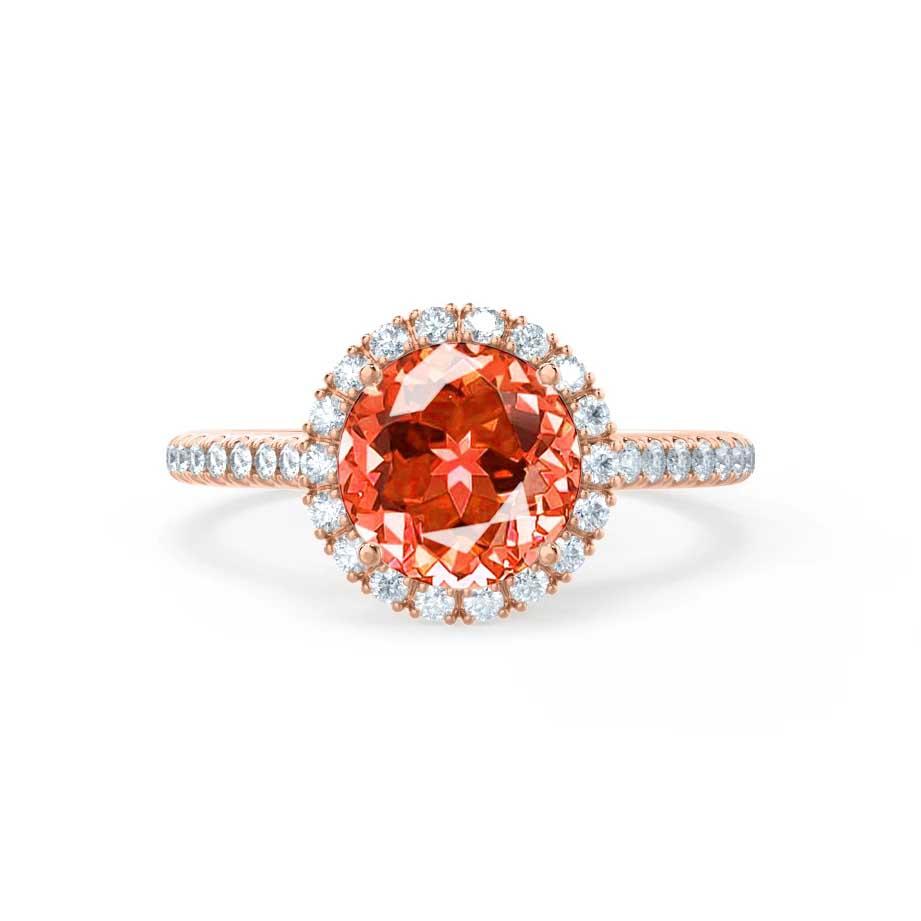 Angled shot capturing the soft femininity of the rose gold halo and the gem’s warm, fiery glow.