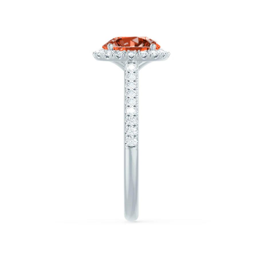 Side profile highlighting the raised halo setting, expertly crafted to enhance light performance from all angles.