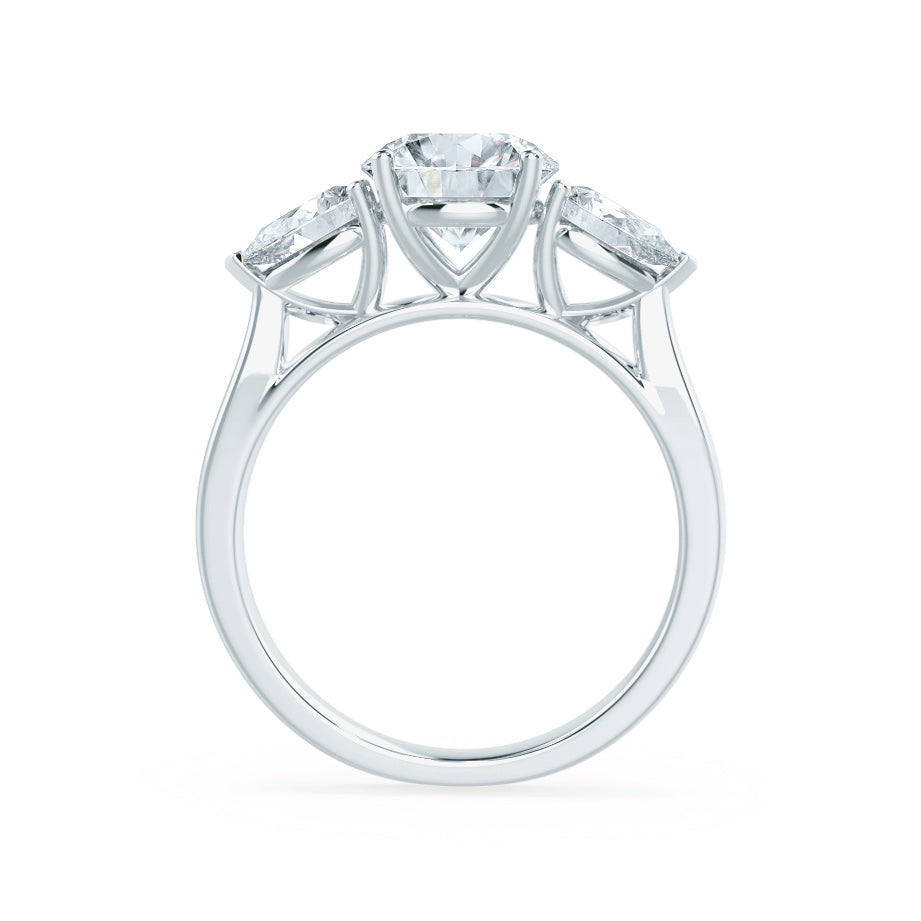 Side view of oval lab diamond trilogy ring with pear lab diamond accents in platinum